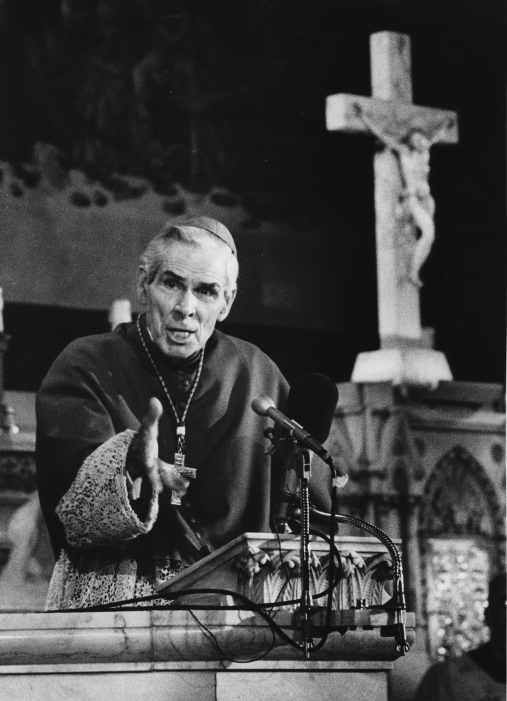 Archbishop Fulton J. Sheen is pictured at a pulpit in an undated file photo. In the late 1920's, he preached on "The Catholic Hour" radio program and later became its most popular host. He moved to television in the 1950s with "Life is Worth Living." He was named a bishop in 1951 and became archbishop in 1969. (CNS file photo) (May 25, 2011) See POPE-SHEEN May 25, 2011.