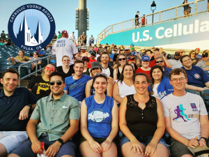 Group of people smiling together while participating in a shared activity